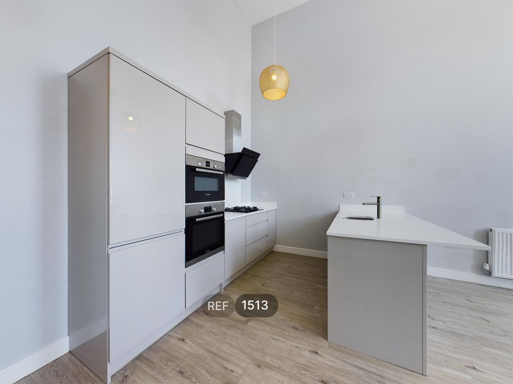 Property photo 1 of 12 Kitchen/Living Area