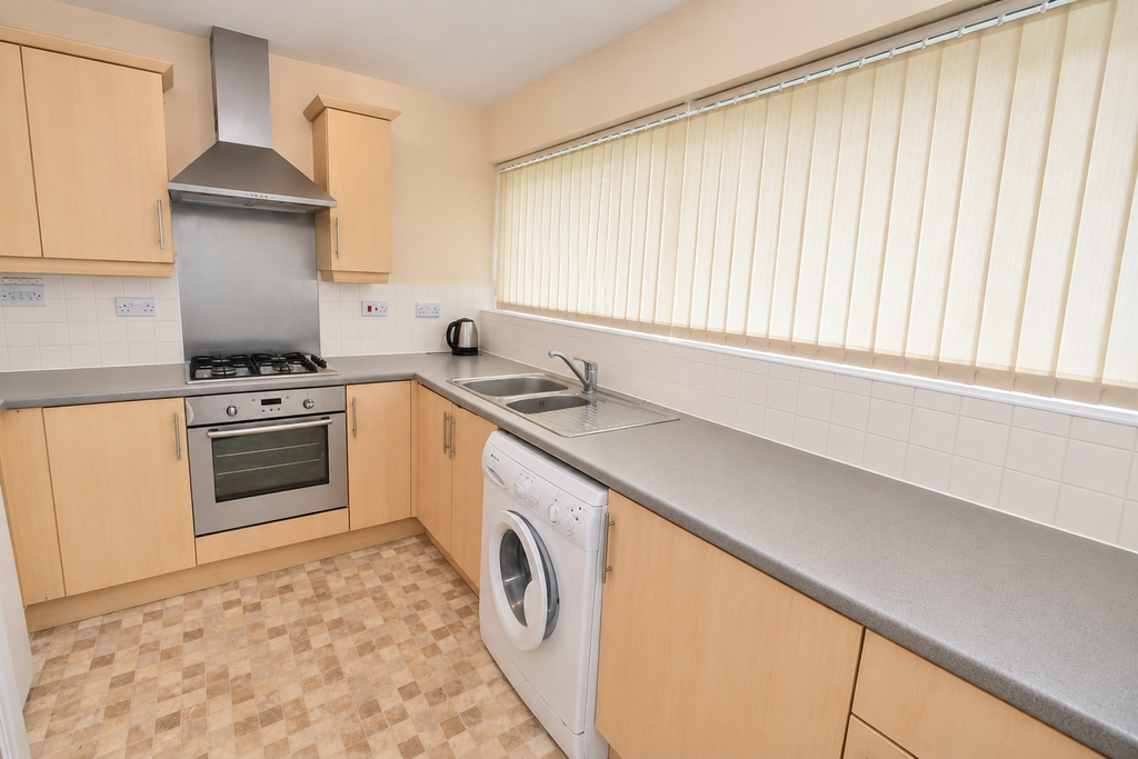 Property photo 3 of 9 Kitchen
