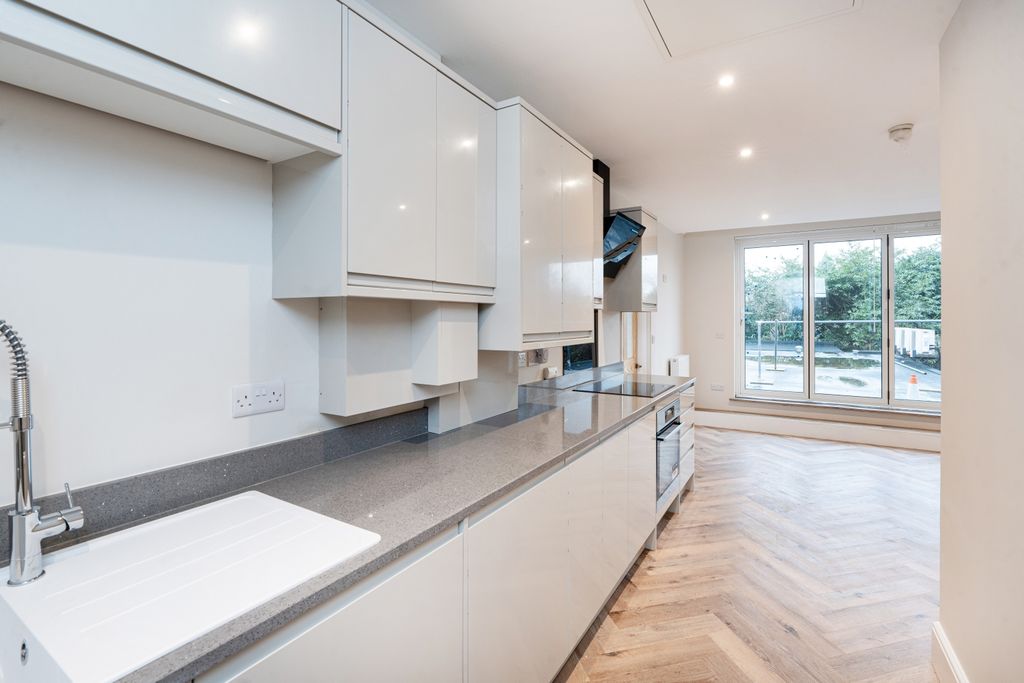 Property photo 3 of 15 Kitchen Living Area