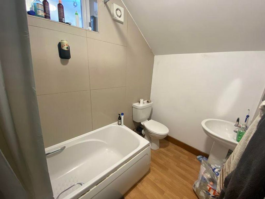Property photo 1 of 8 A Tidy Bathroom Featuring A Bath And Essential Ame...