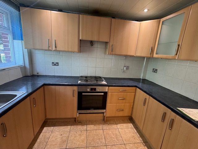 Property photo 1 of 12 Kitchen