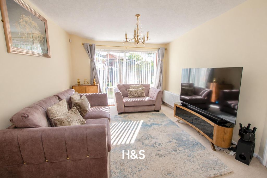 Property photo 3 of 15 3 Cornbury - Lounge.Png
