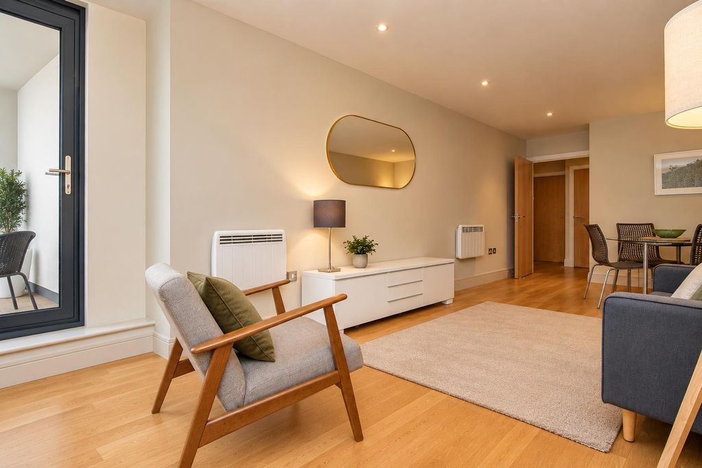 Property photo 3 of 8 Warm Minimalist Living And Dining Room.Png