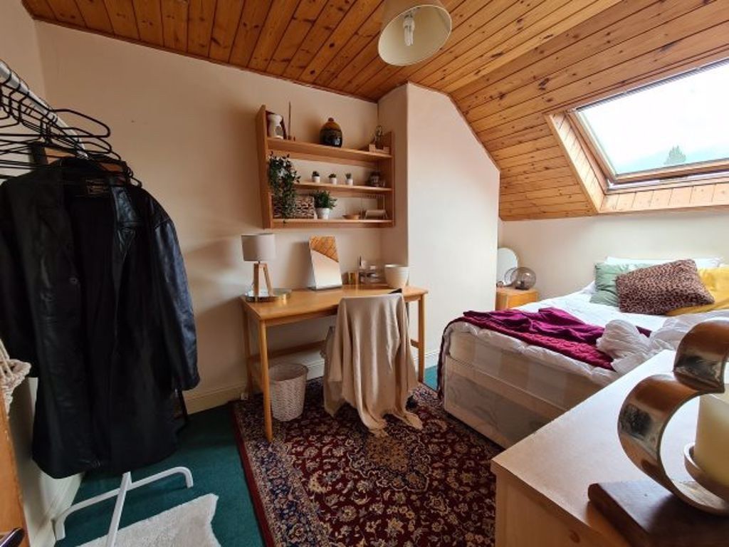 Property photo 1 of 25 Bright And Cozy Master Bedroom Featuring A Sloped ...