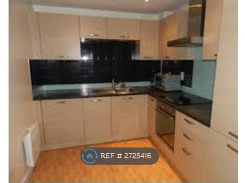 Property photo 3 of 8 Kitchen