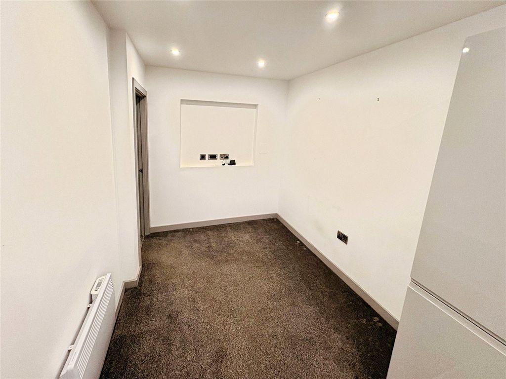 Property photo 3 of 6 Kitchen/Living Room