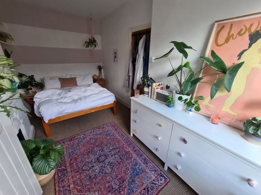 Property photo 3 of 19 A Spacious And Well-Lit Master Bedroom Featuring A...