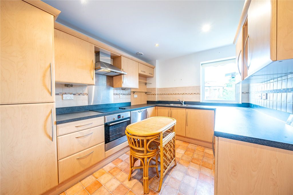 Property photo 3 of 14 Dining Kitchen