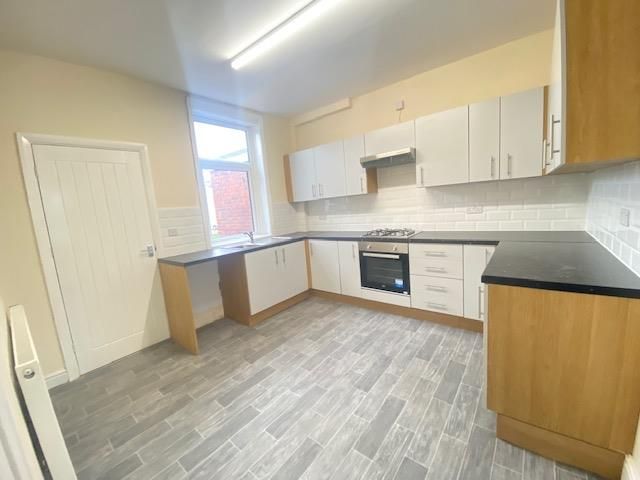 Property photo 2 of 12 Kitchen