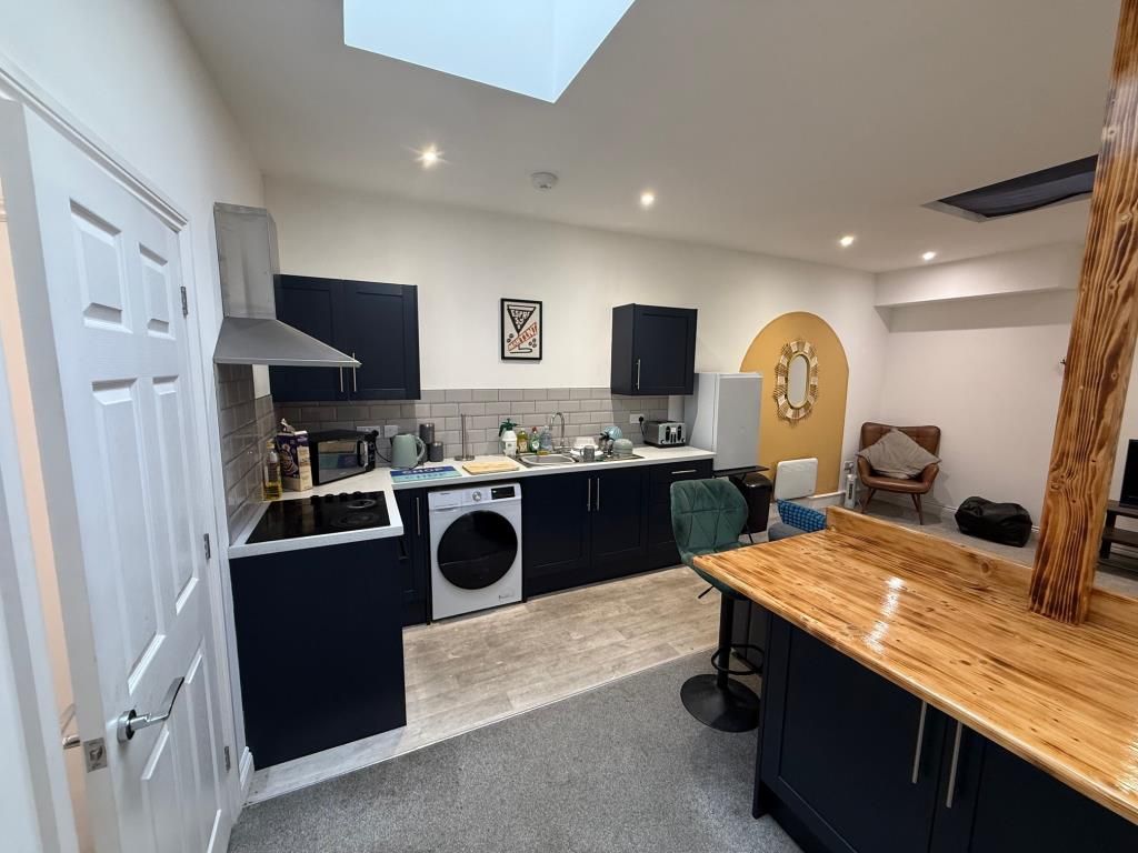 Property photo 3 of 8 Kitchen Area