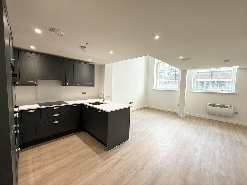 Property photo 1 of 8 Modern Open-Plan Kitchen With Stylish Cabinetry...