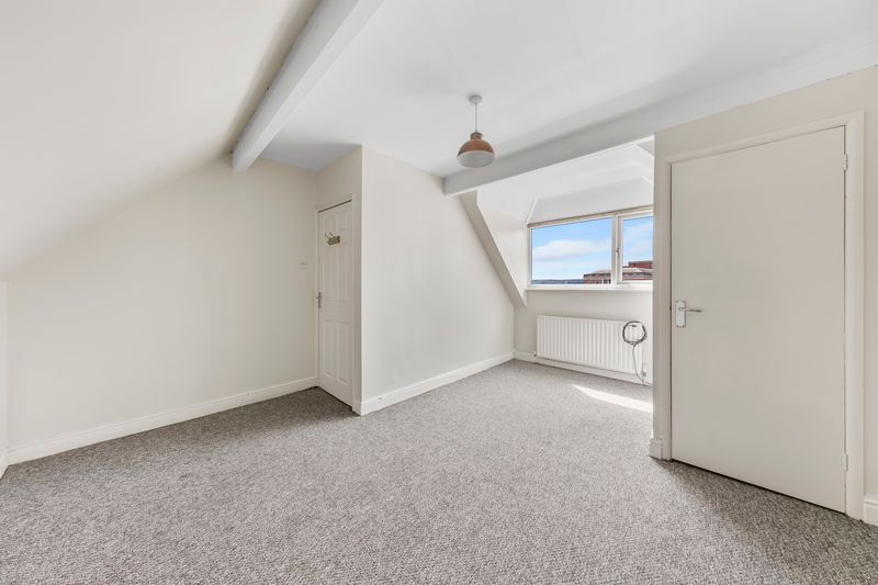 Property photo 2 of 20 Attic Bedroom