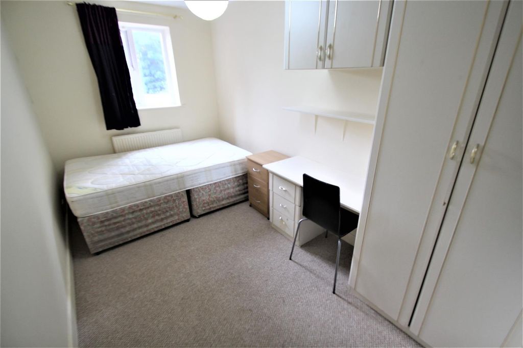 Property photo 2 of 5 A Bright And Simple Student Bedroom Featuring A Si...
