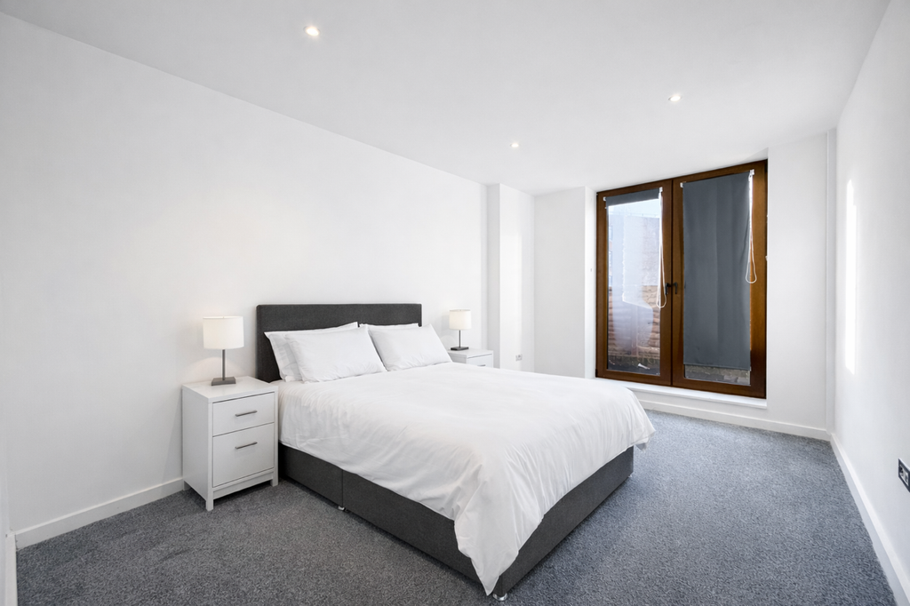 Property photo 2 of 7 Modern Bedroom With Natural Light