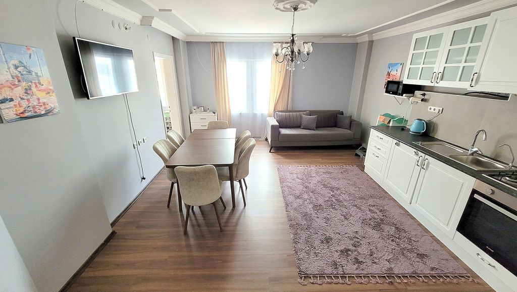 Property photo 2 of 21 Notable Alanya Property For Sale In Mahmutlar - Modern Open-Plan Living Area