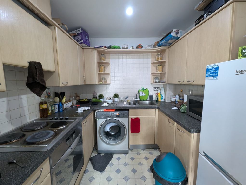 Property photo 3 of 7 Kitchen