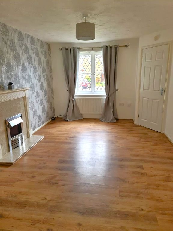 Property photo 3 of 12 Living Room