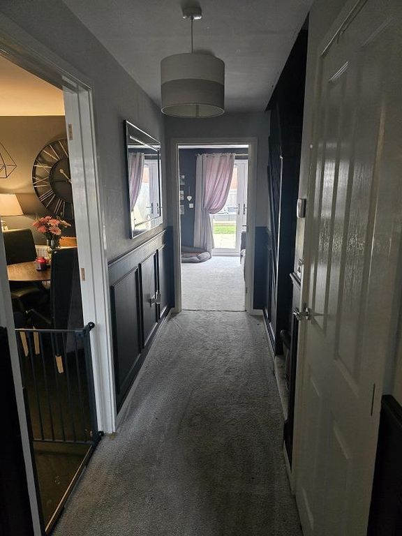 Property photo 2 of 13 16 Romney - Hallway 2.Jpg