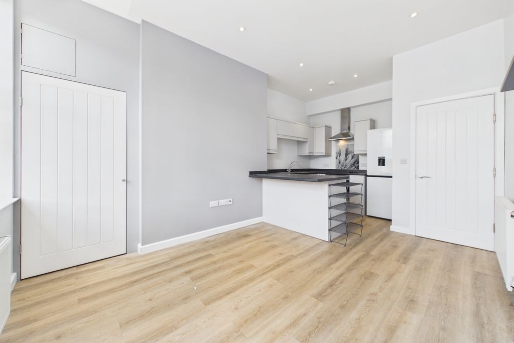 Property photo 2 of 11 Living Area