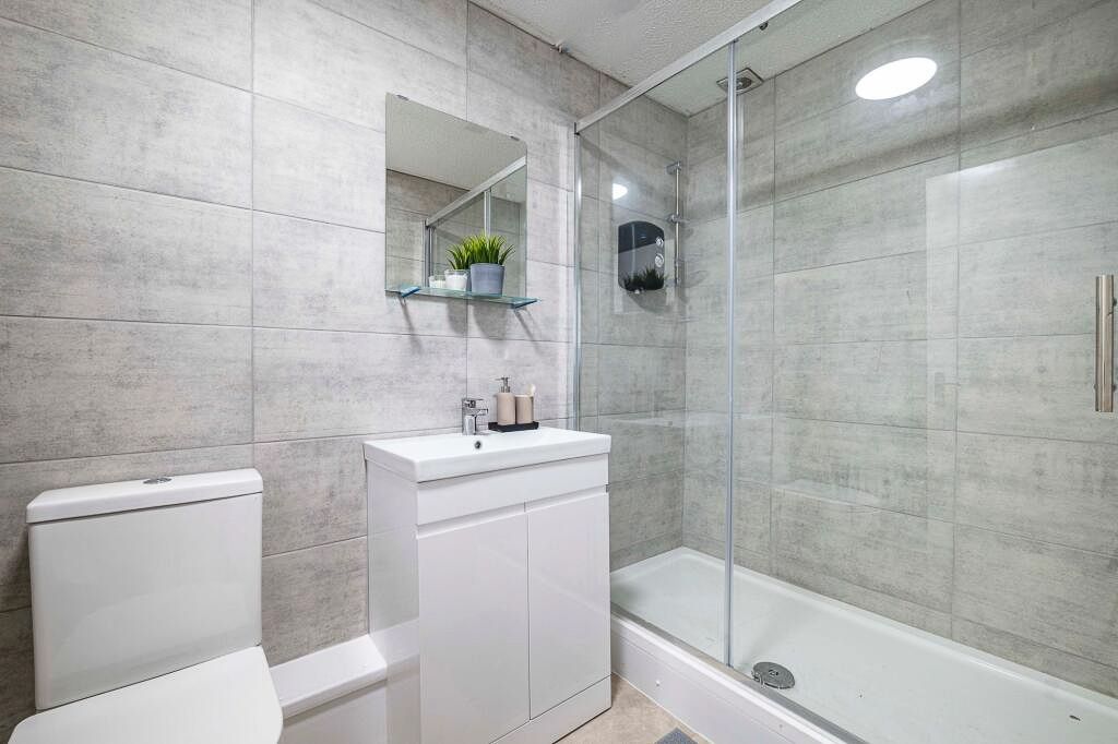 Property photo 3 of 8 Contemporary Tiled Bathroom With A Walk-In Shower,...
