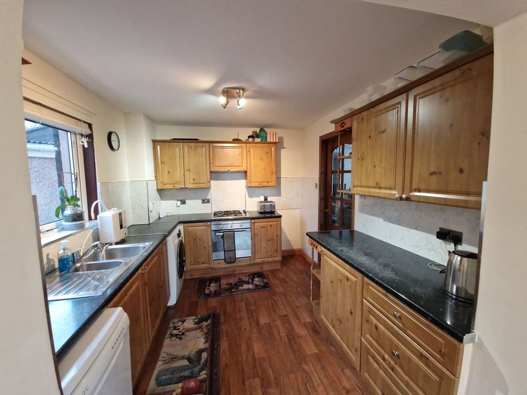 Property photo 3 of 13 Kitchen