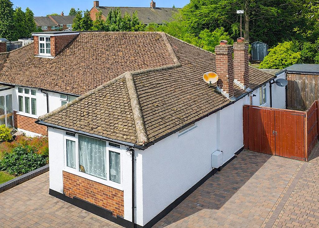 Property photo 1 of 18 Suburban House With Red Brick Accents.Png