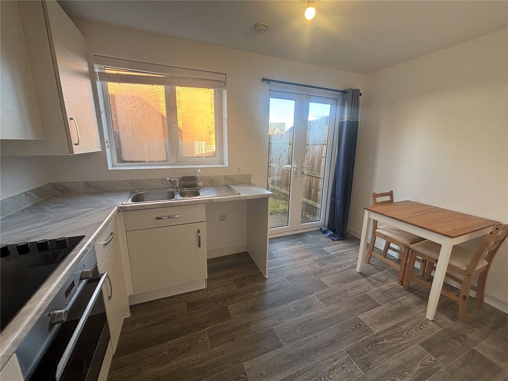 Property photo 3 of 12 Kitchen