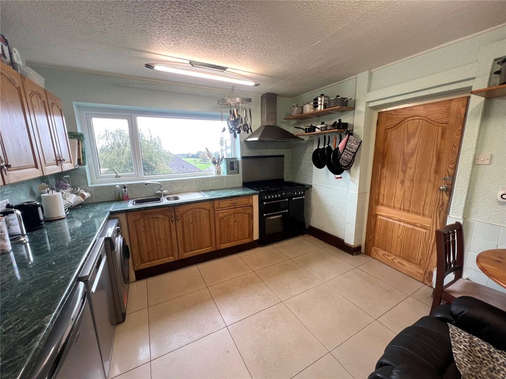 Property photo 2 of 12 Kitchen