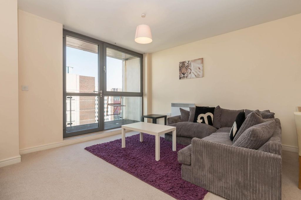 Property photo 1 of 16 Living Area