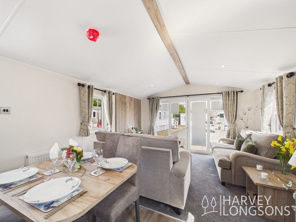 Property photo 3 of 12 Dining Area And Lounge With French Doors