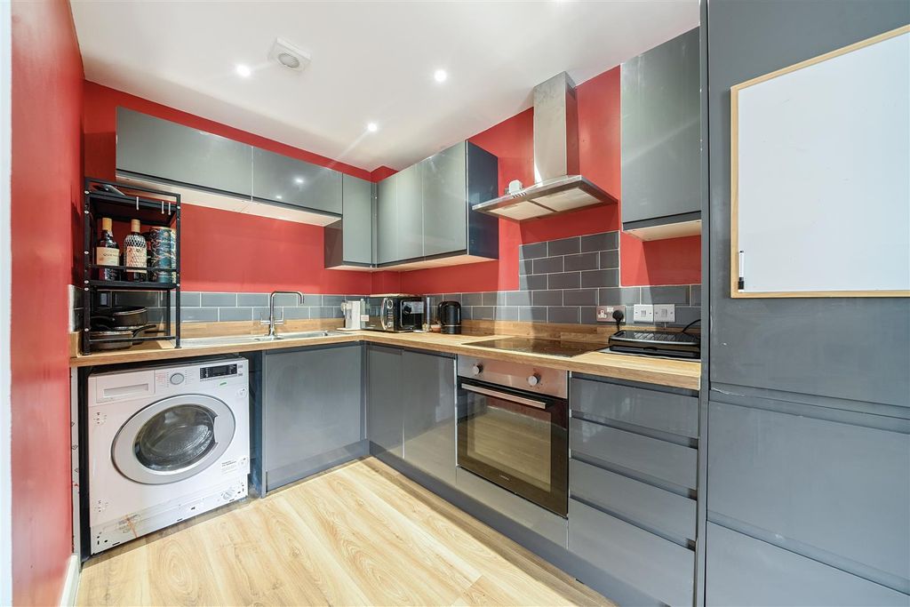 Property photo 3 of 12 Kitchen