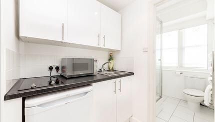 Property photo 3 of 7 Kitchen