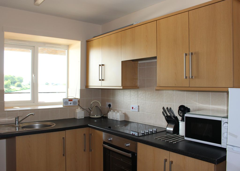 Property photo 1 of 6 Kitchen