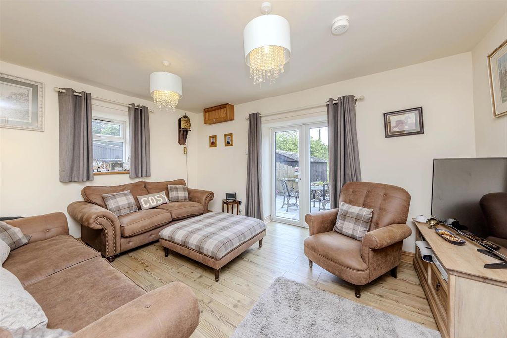 Property photo 2 of 63 Sitting Room