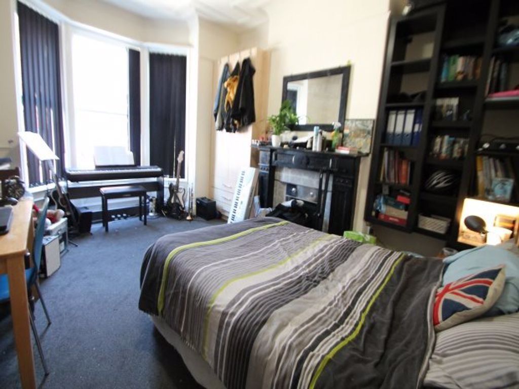 Property photo 3 of 26 Spacious And Well-Lit Master Bedroom Featuring A c...