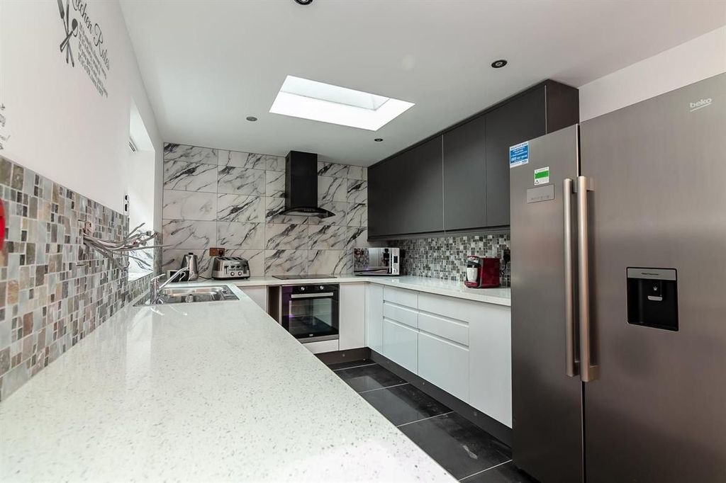 Property photo 2 of 15 Modern Kitchen With Skylight And Marble Finish...