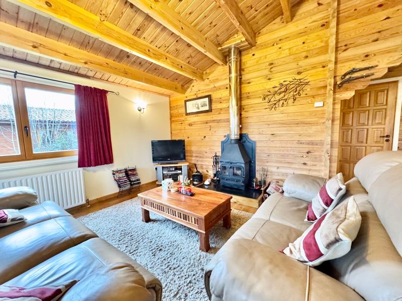 Property photo 2 of 21 Lounge With Wood Burner