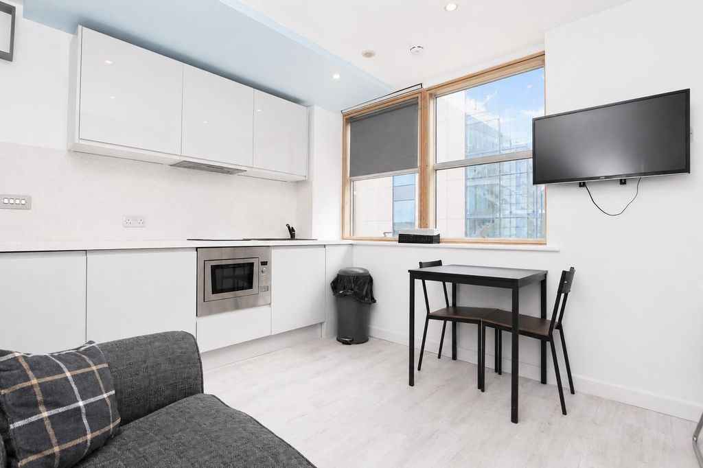 Property photo 1 of 6 Modern Open Plan Kitchen And Bright Dining Area...