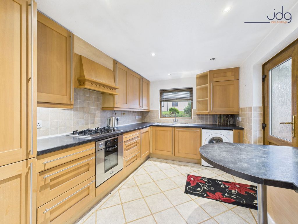 Property photo 2 of 10 Kitchen With Breakfast Bar