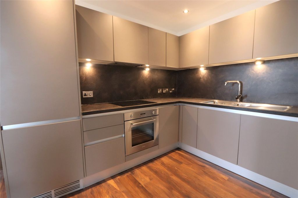 Property photo 3 of 12 Kitchen Area