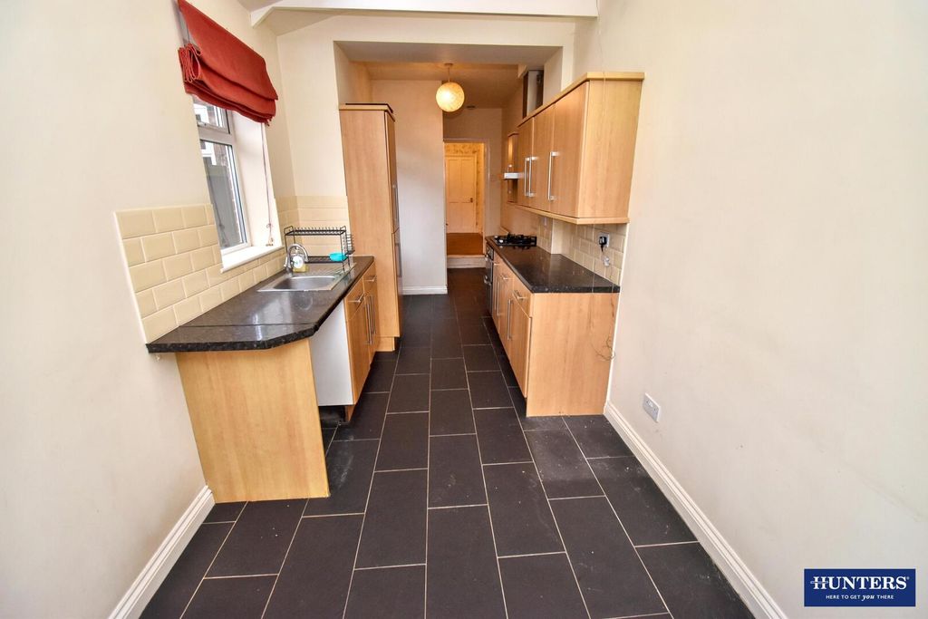 Property photo 2 of 12 Kitchen