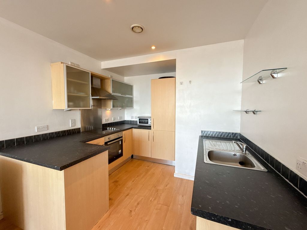 Property photo 3 of 12 Kitchen