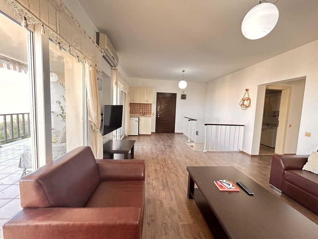 Property photo 2 of 24 A Modern, Furnished, Reverse Duplex Bodrum Apartment For Sale Â€“ Living Room And Kitchenette With Balcony