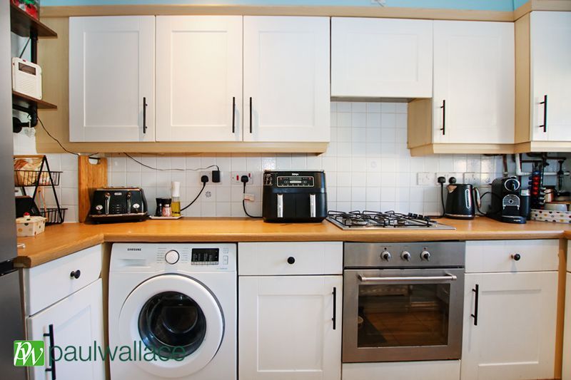 Property photo 3 of 12 Kitchen