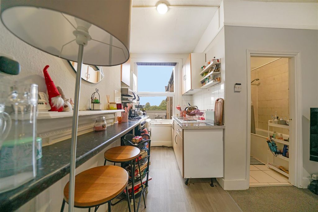 Property photo 3 of 11 Kitchen With Breakfast Bar