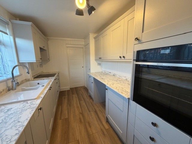 Property photo 3 of 7 Kitchen