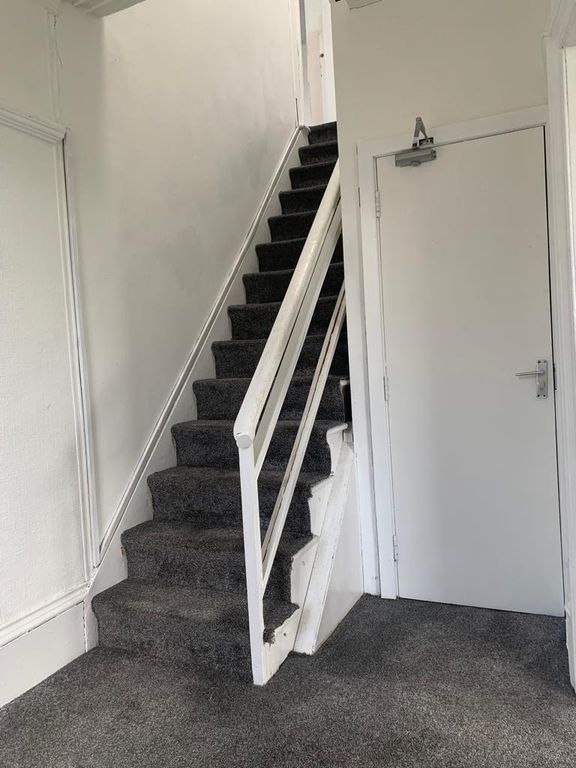 Property photo 3 of 19 1st Floor Hallway/Stairs