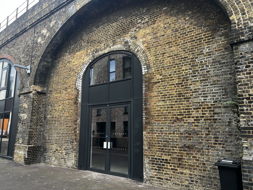 Property photo 2 of 3 The Front Of An Arch, With Glazing On The Bottom Half And Door Allowing You To See Into The Arch Interior.