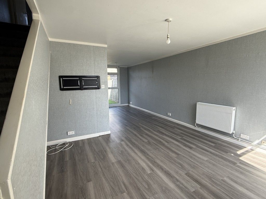 Property photo 3 of 9 Living Room To Dining Room Of House In Need Of Improvement