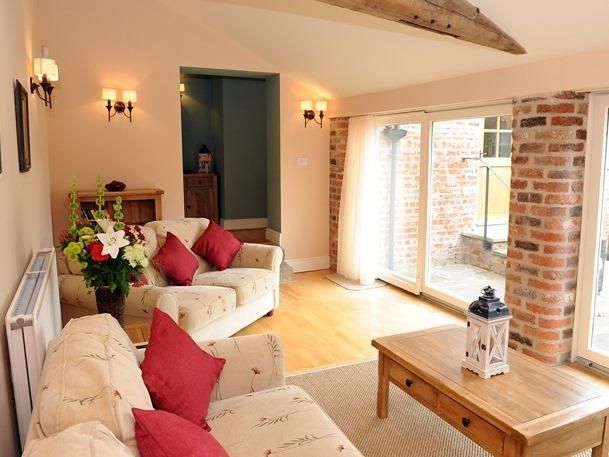 Property photo 2 of 16 The Byre Living Room With Patio 2.Jpg